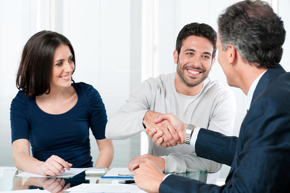 Business owners meeting and shaking hands