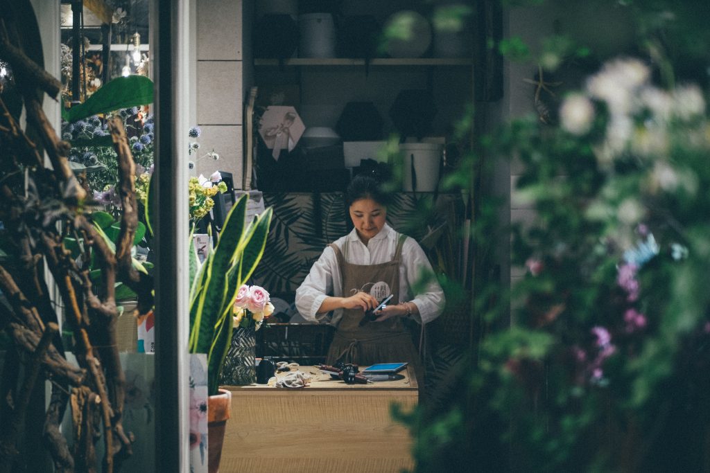 Woman at a plant store